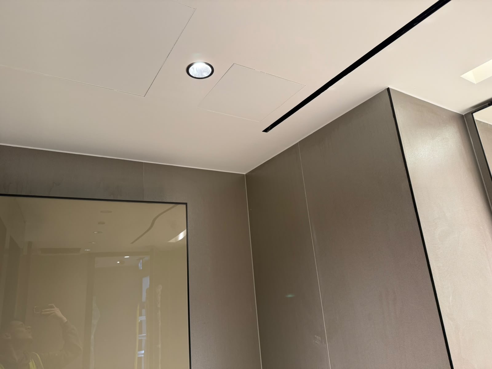 Commercial wall panel and ceiling joints sealed by Blackline Mastic