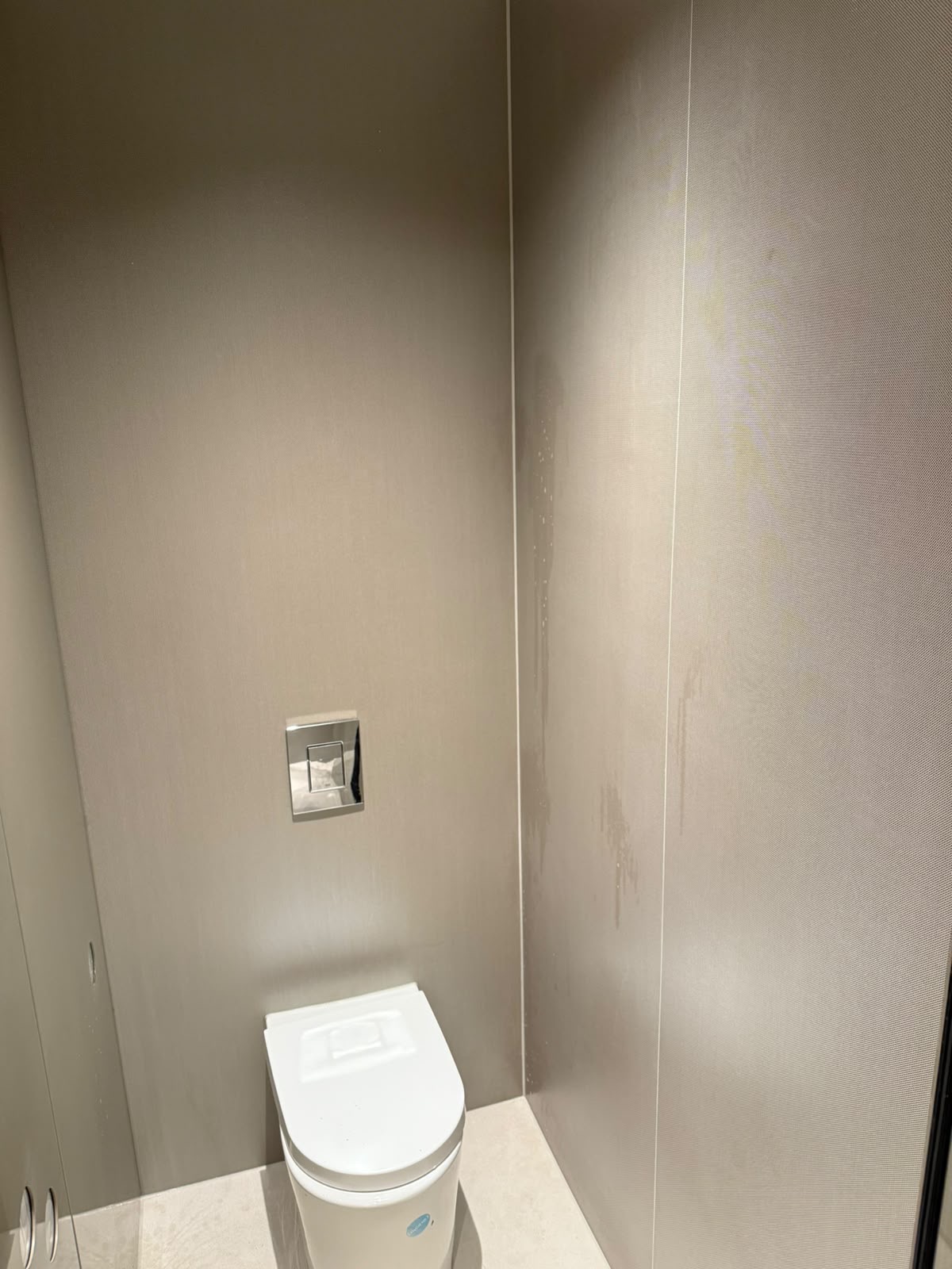 Commercial washroom panelling sealed by Blackline Mastic
